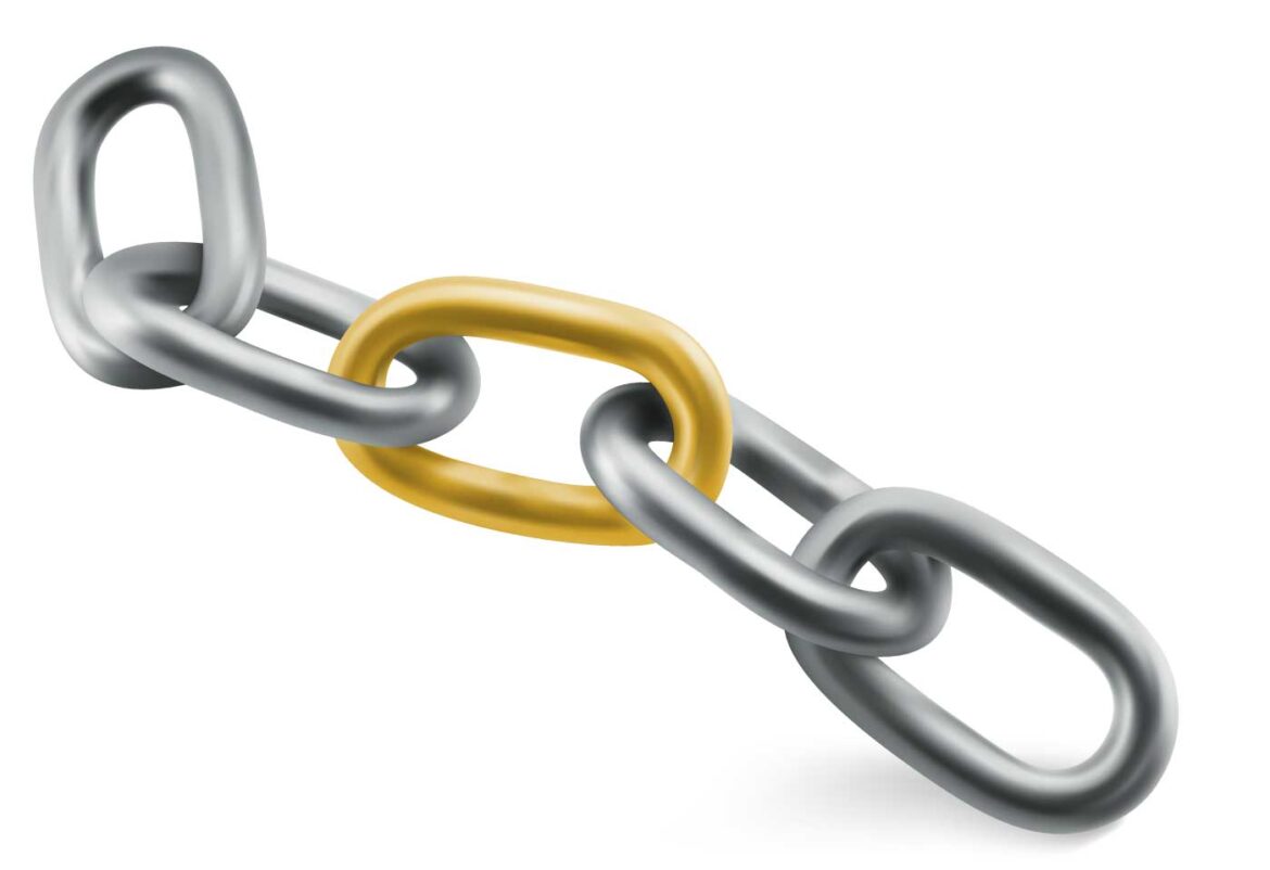 gold link between chain of silver links showing the idea of a connection